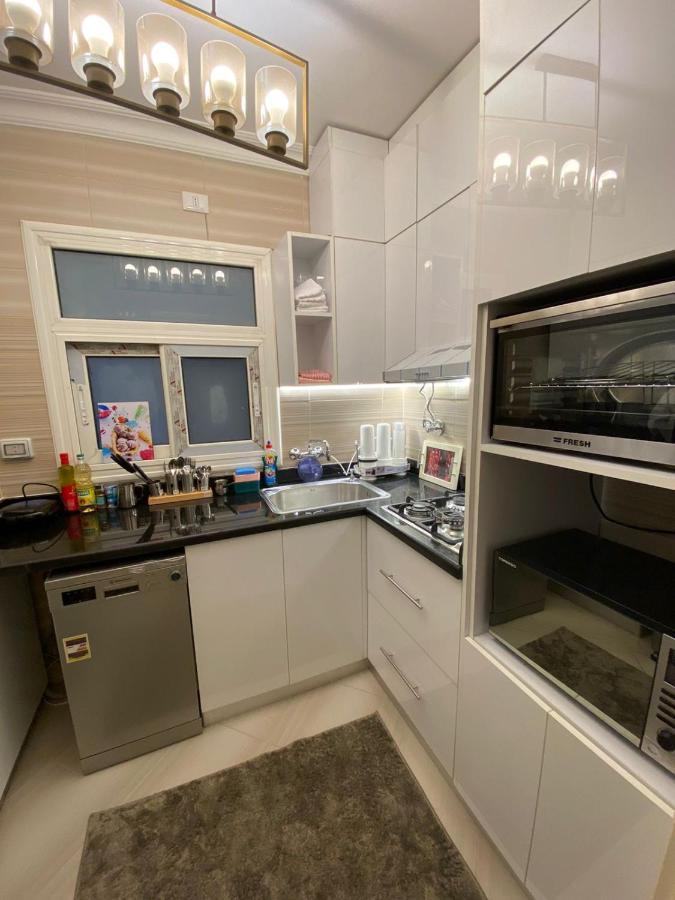 Madinaty Well-Furnished 3- Bedroom Apartment - شقة فندقيه للايجار مدينتي Madinat ash Shuruq Kültér fotó